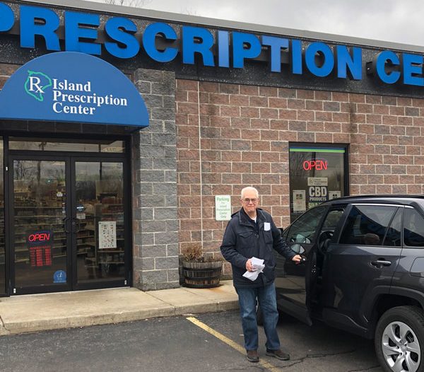 Free Island Prescription Delivery driver leaving Island Prescription Center